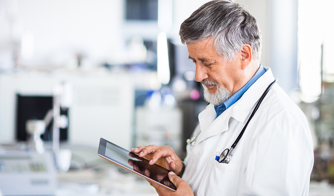 IT technician supporting secure medical practice workstations and healthcare technology