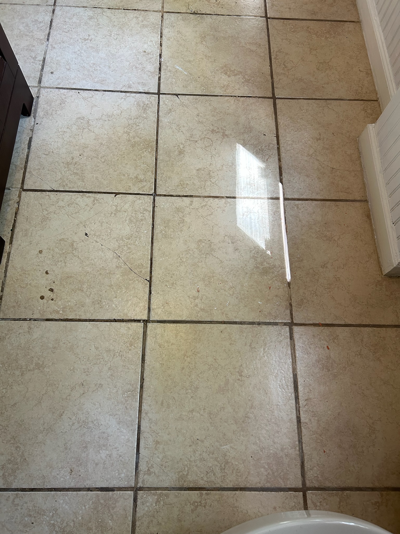 Bathroom floor before grout restoration in Woodstock GA