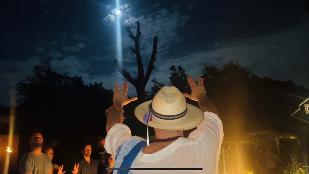 LightFootCliff pointing to moon