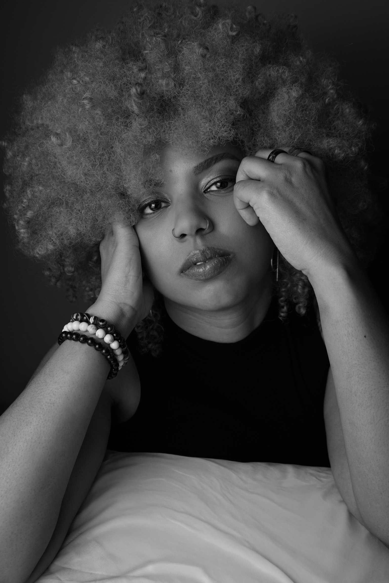 Intense close-up beauty and character portrait, warm low key light