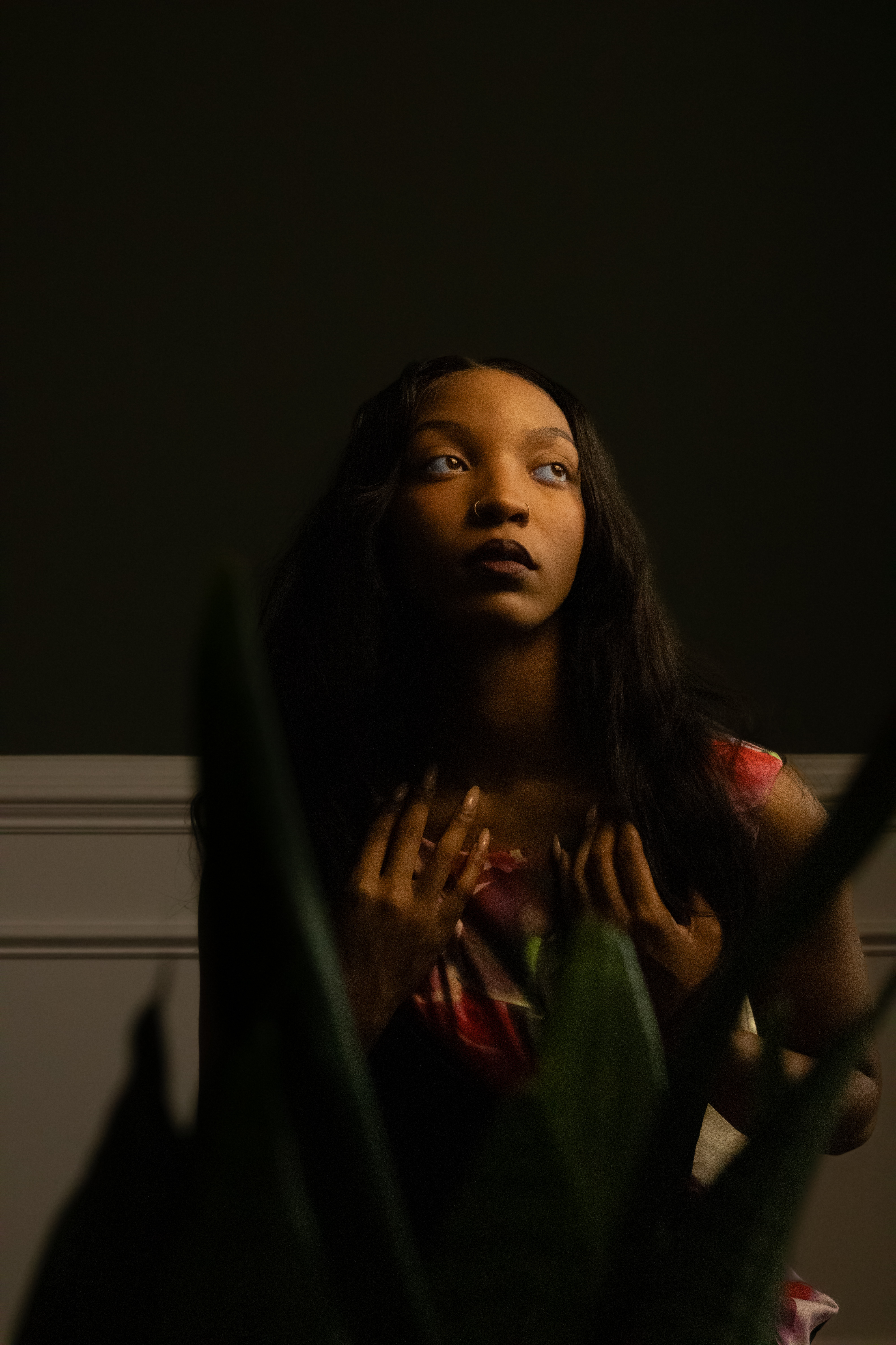 Editorial portrait pair, sculptural form in low warm key light