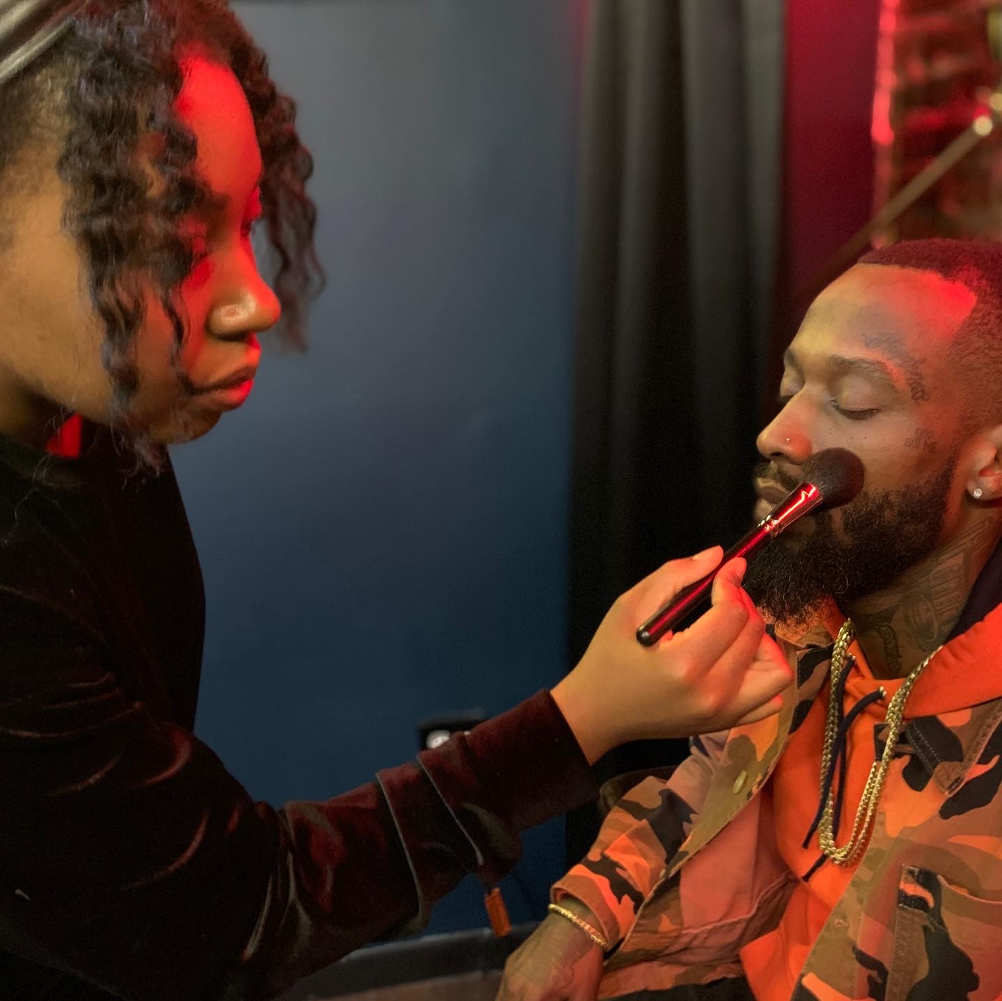 Avida Thompson applying makeup to Walt from Black Ink Crew New York