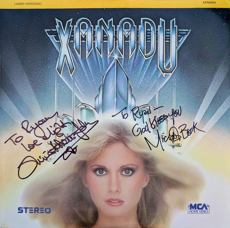 The Laserdisc Jacket for Xanadu signed by Olivia Newton-John and Michael Beck