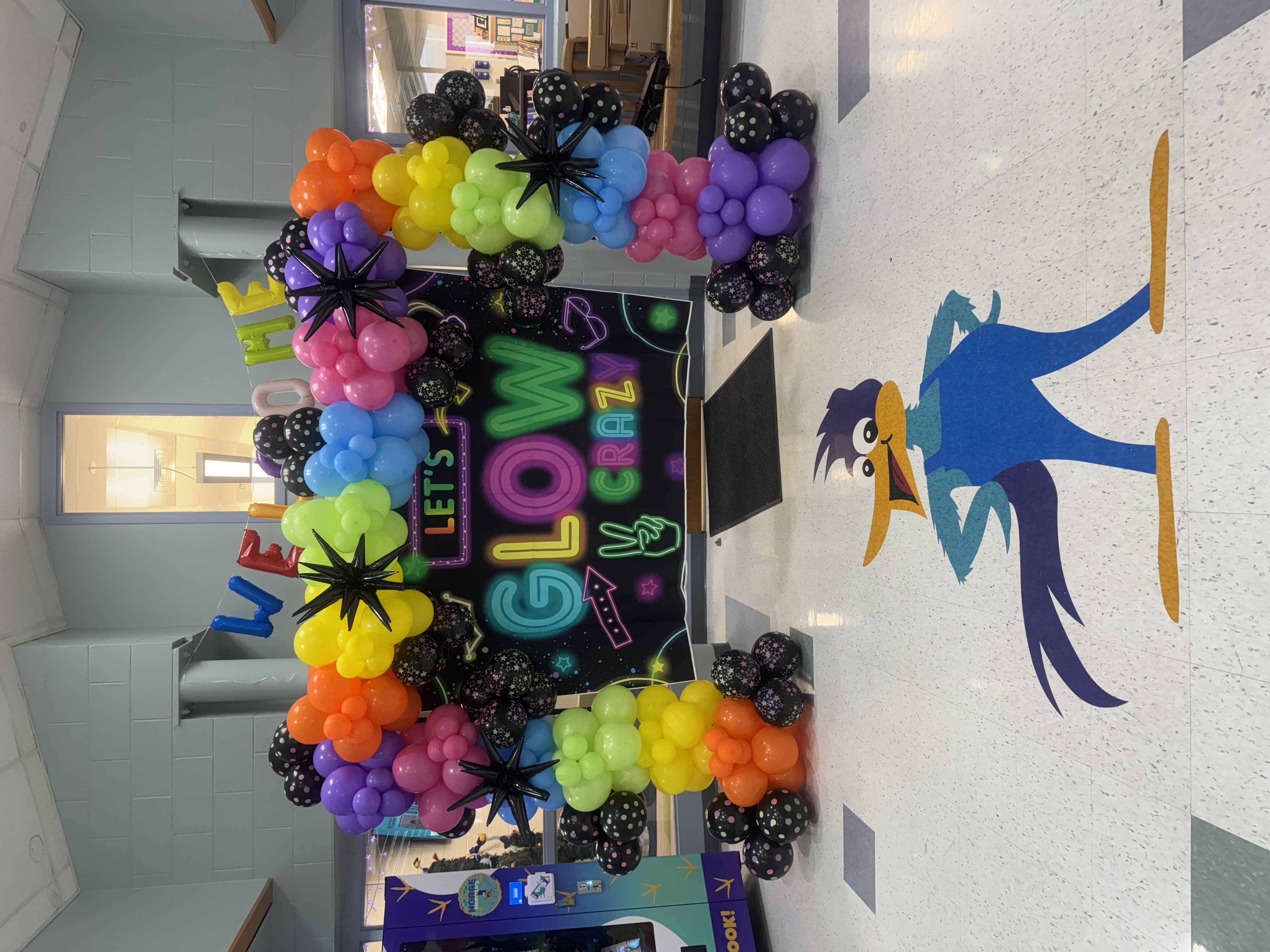 Glow crazy rainbow balloon arch