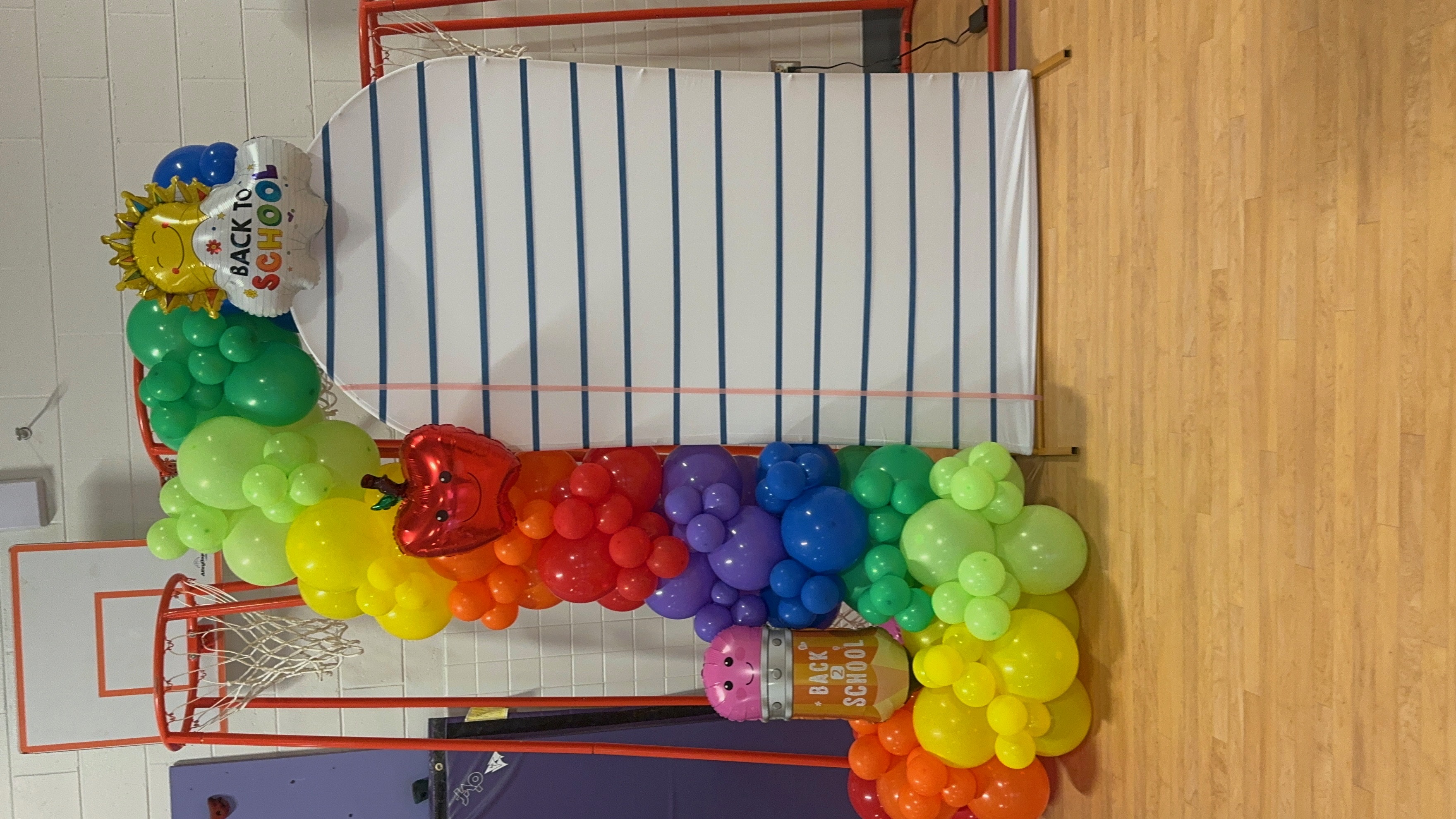 Blue and gold sweet sixteen balloon setup