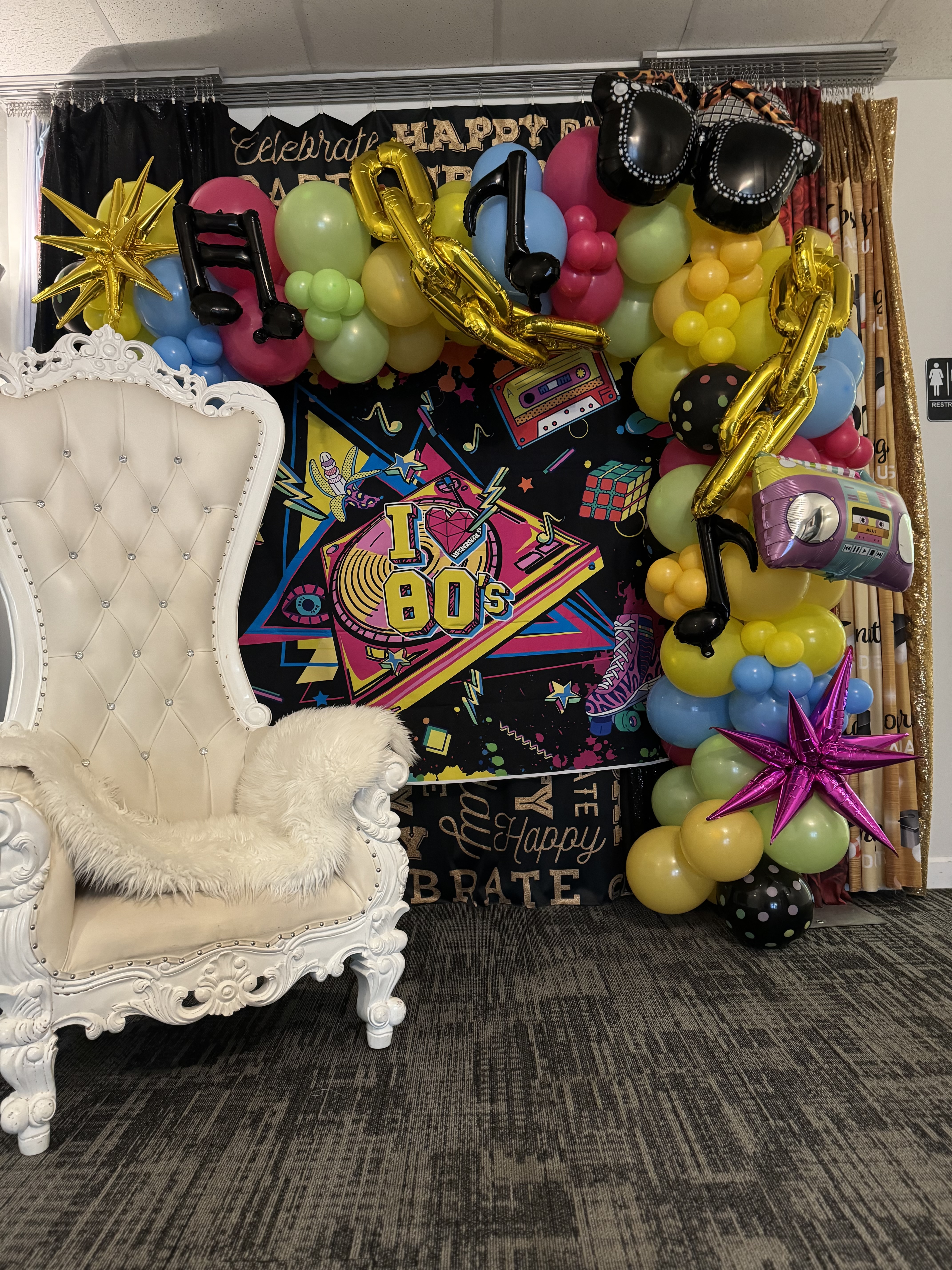 Orange blue and gold balloon installation