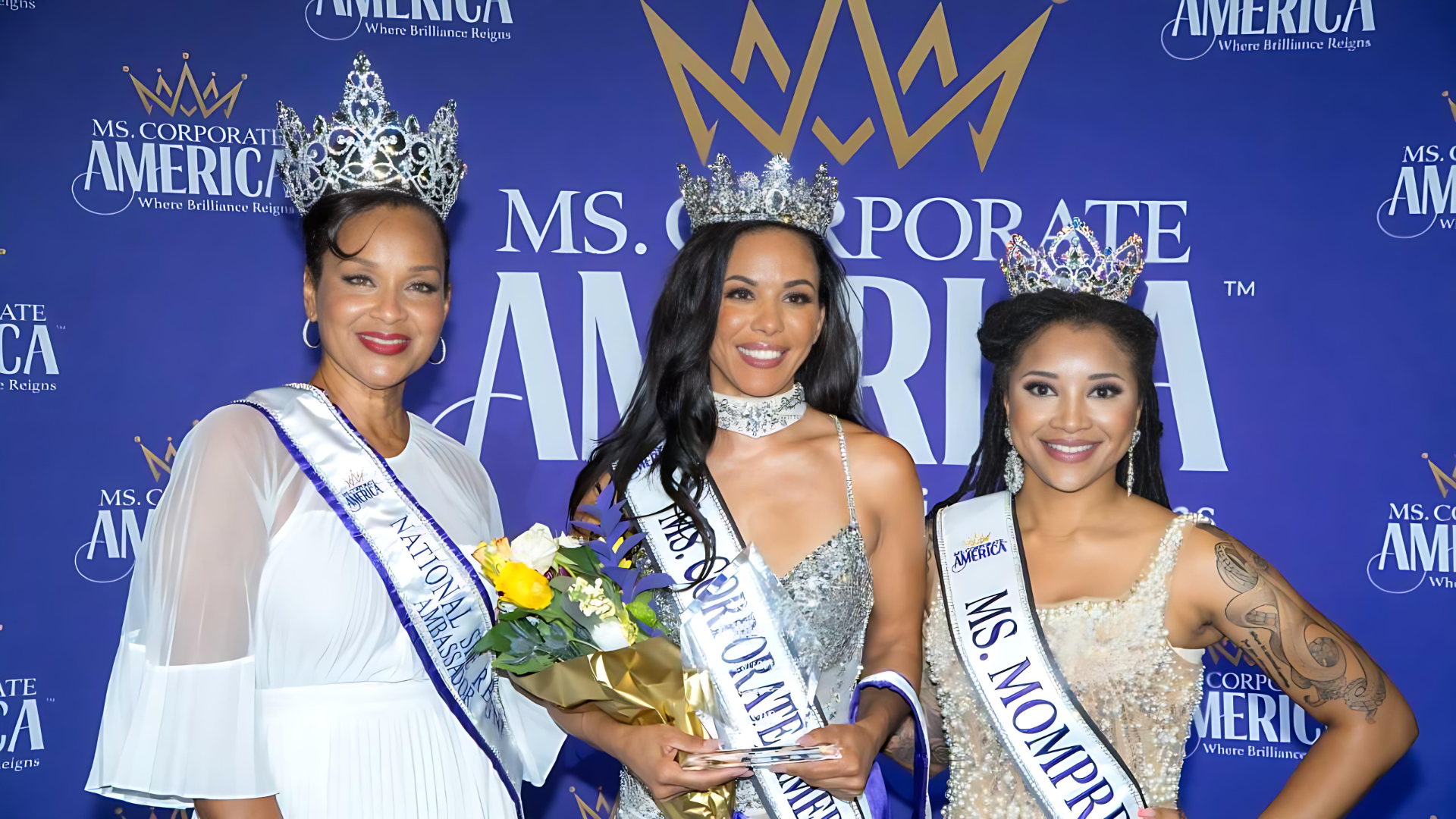 Ms. Corporate America titleholders celebrating on stage
