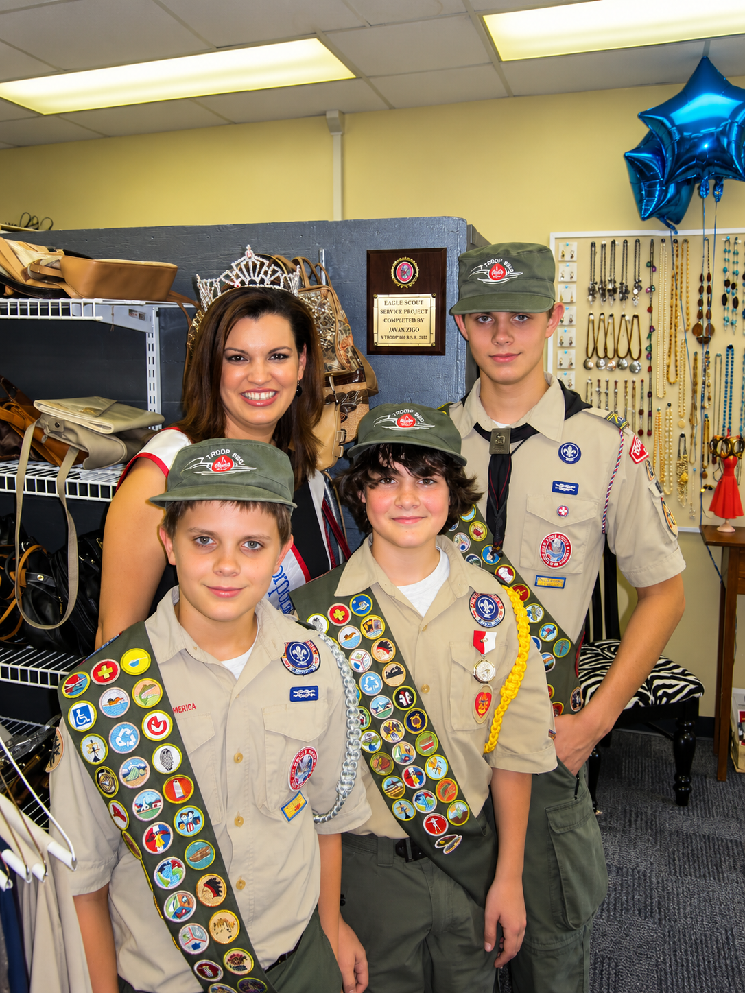 Di-Anne Elise with local Boy Scouts inside the Dress for Success Greater Orlando store ahead of its grand opening