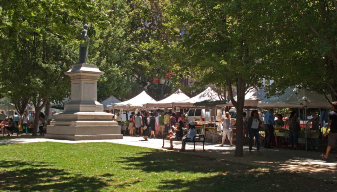 Shoppers at a farmers market in Cesar Chavez Park, Sacramento