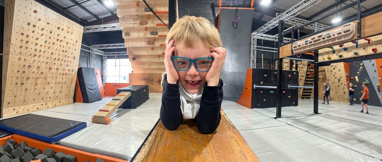 Kids enjoying an indoor climbing and adventure facility