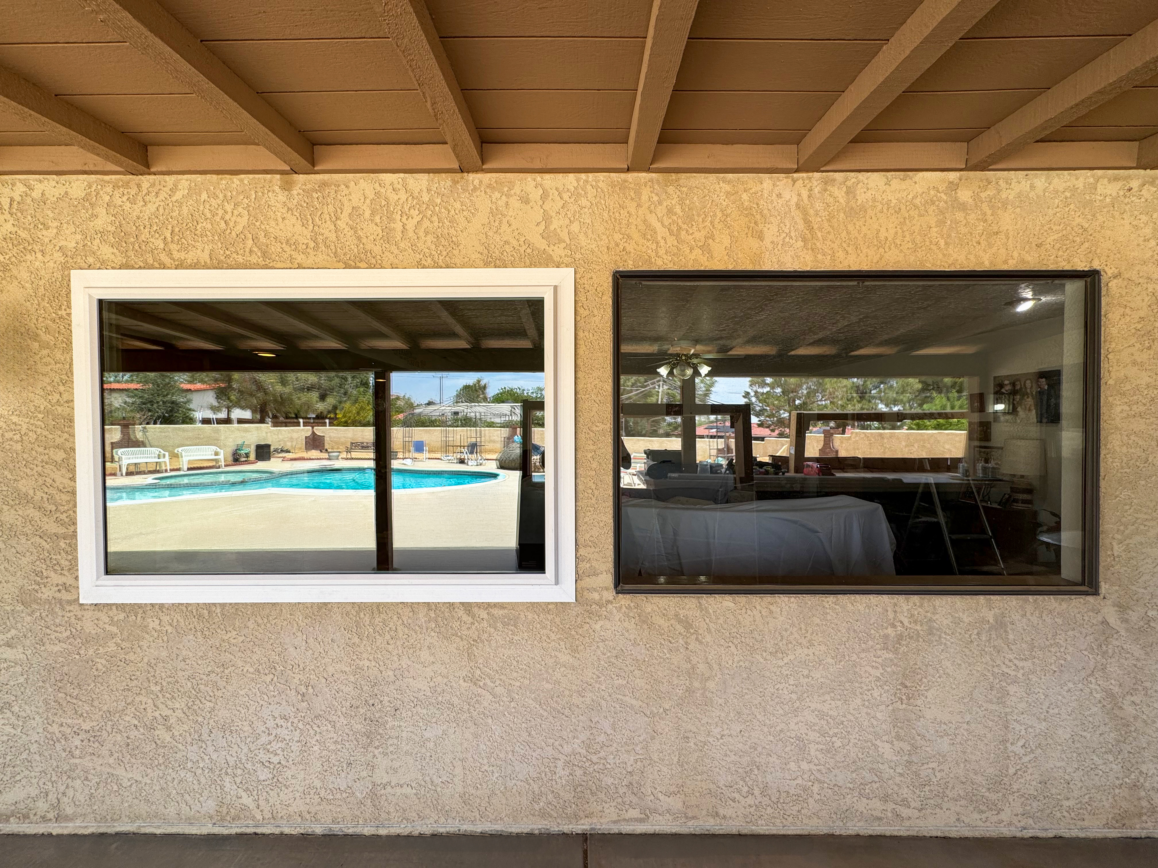 Ingram · original aluminum window and new ProVia unit side by side in the same wall