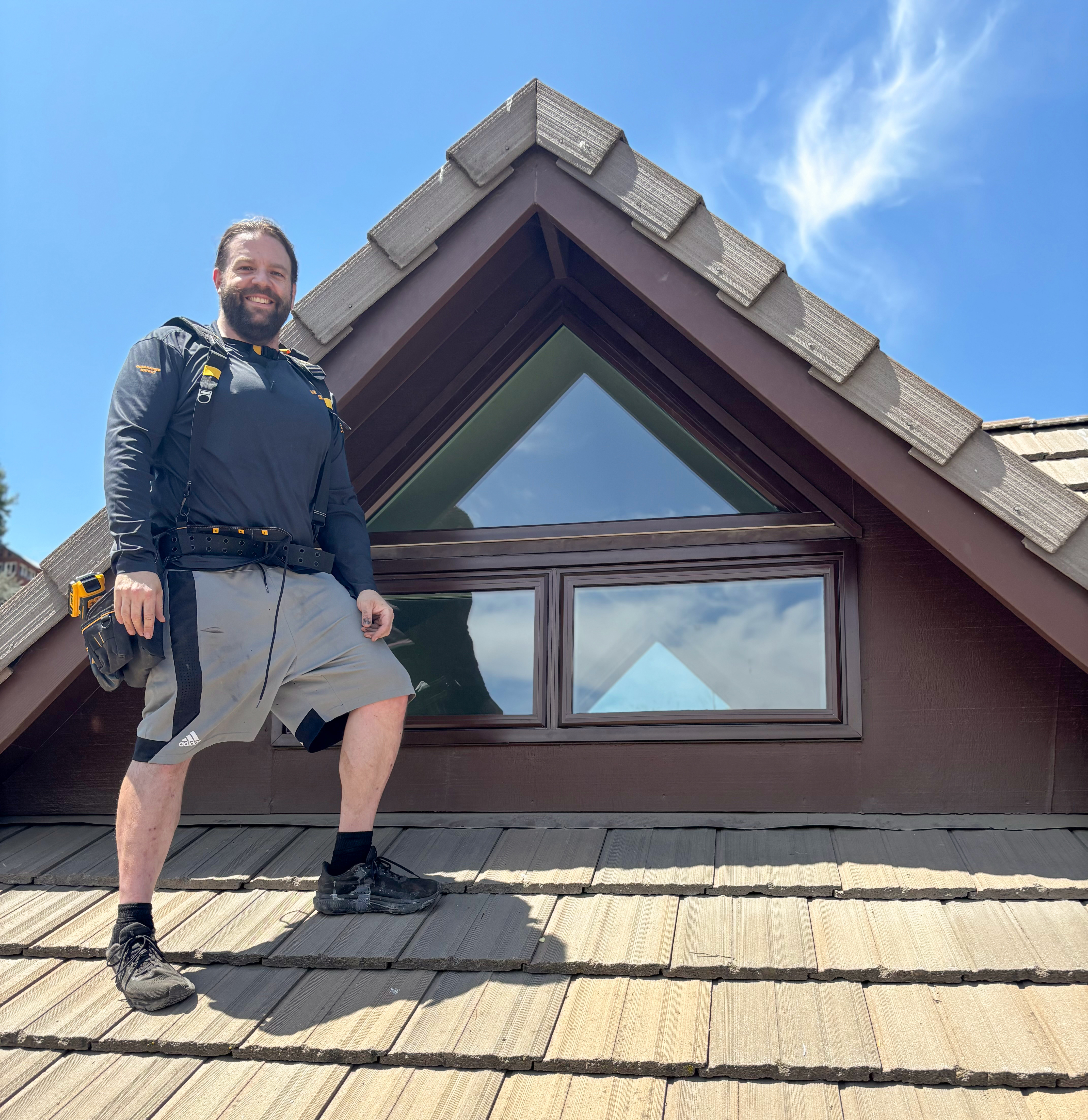 James Reed, founder of Legion Home, on a roof