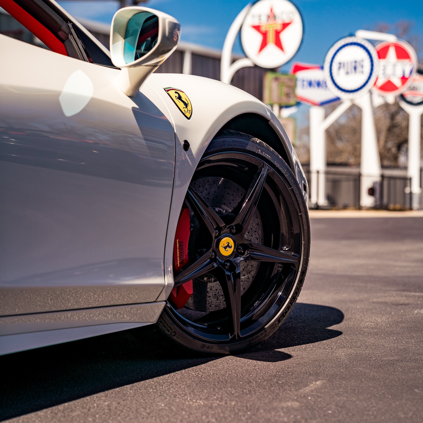 Ferrari Room venue detail, Double E Ranch & Venue, featuring Ferrari emblem and vintage Texaco