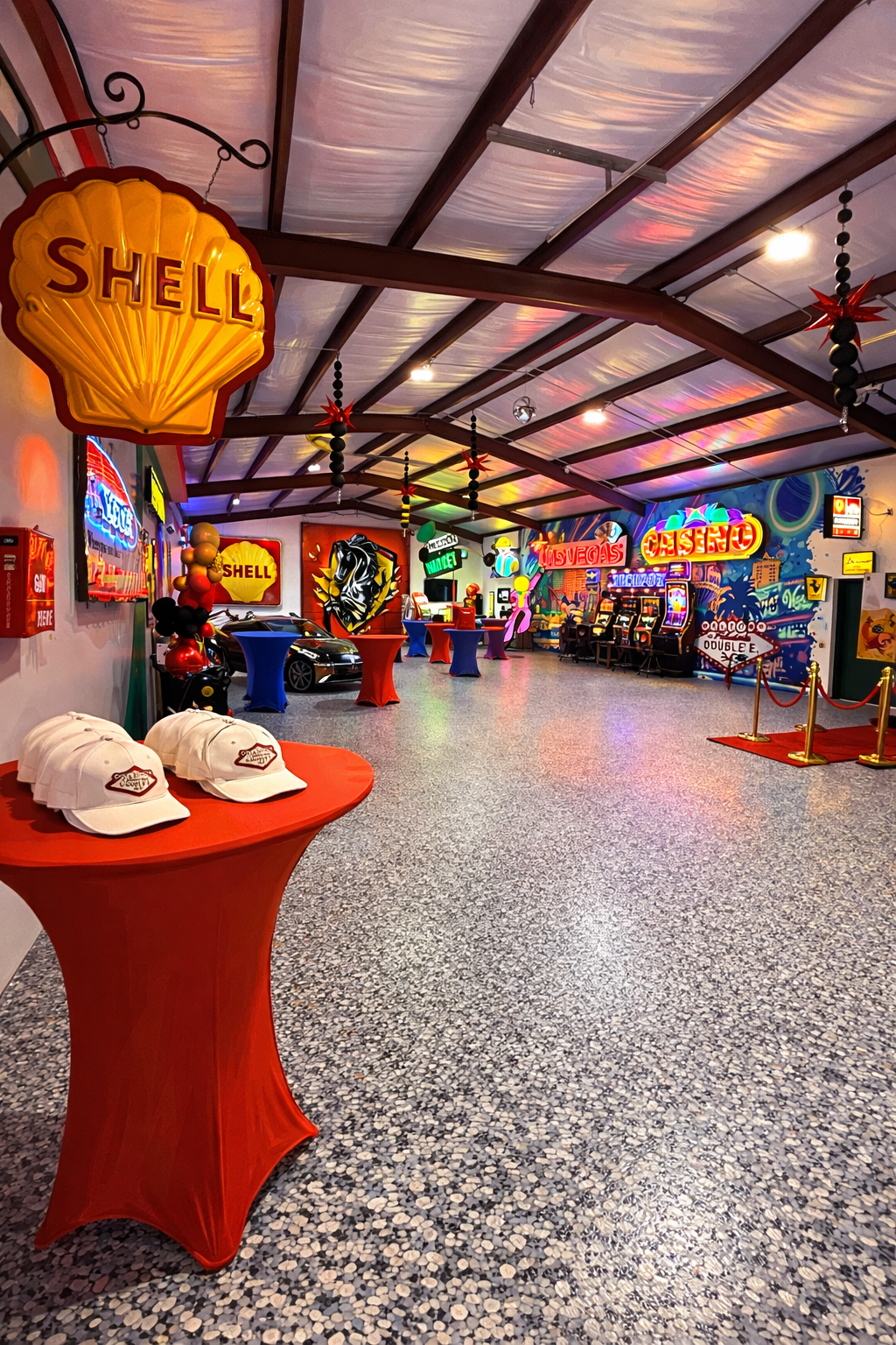 Vintage-themed event space at Double E Ranch & Venue, featuring retro signage and a red
