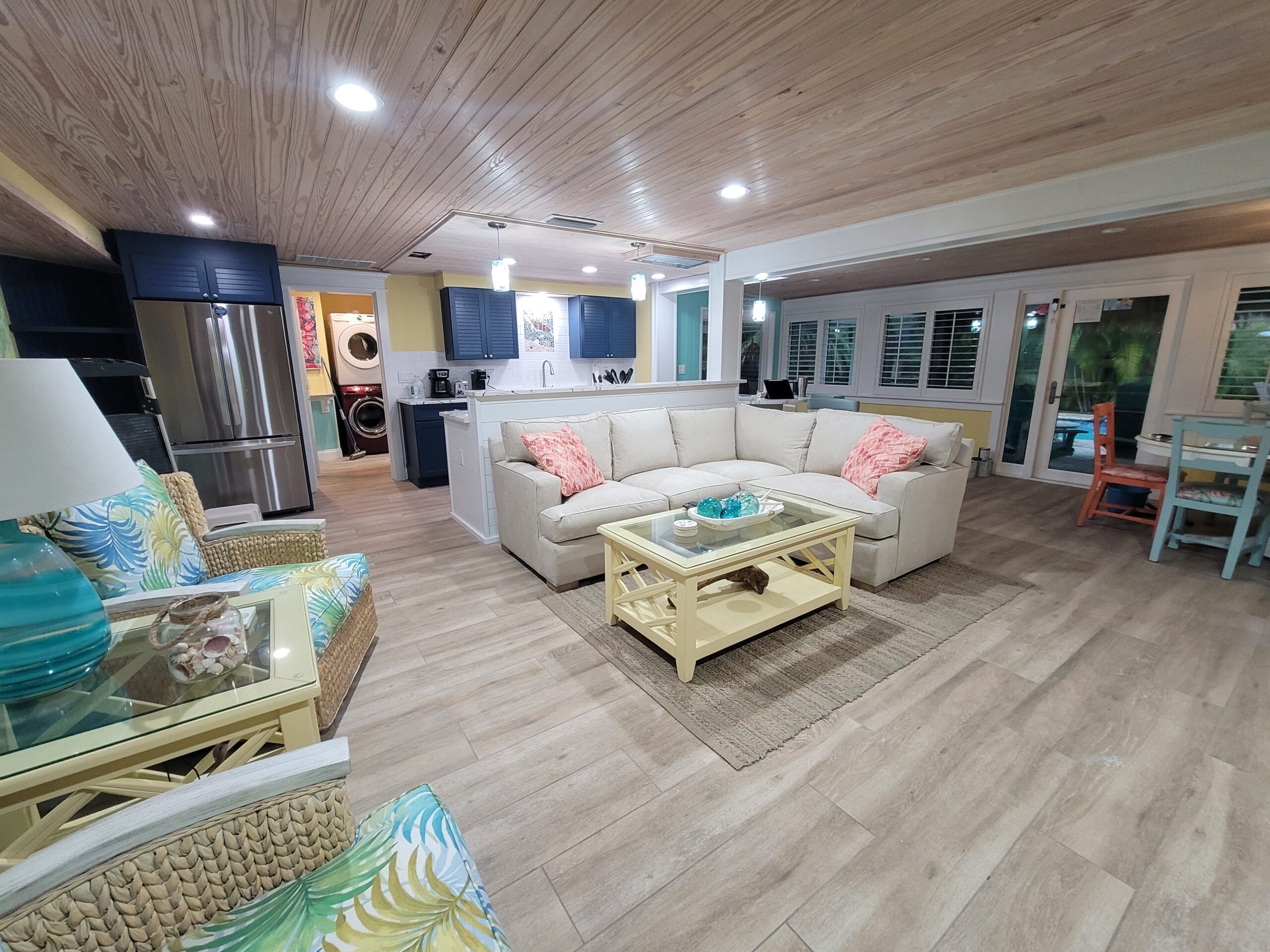 Open-concept coastal living room and kitchen interior painting, Gulf Coast Florida