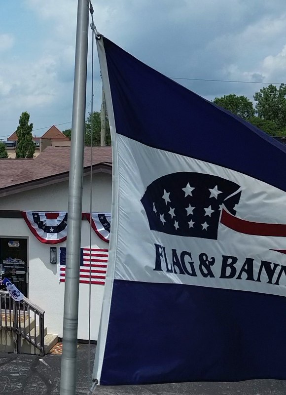 The Flag & Banner Co. company flag flying over the Indianapolis shop