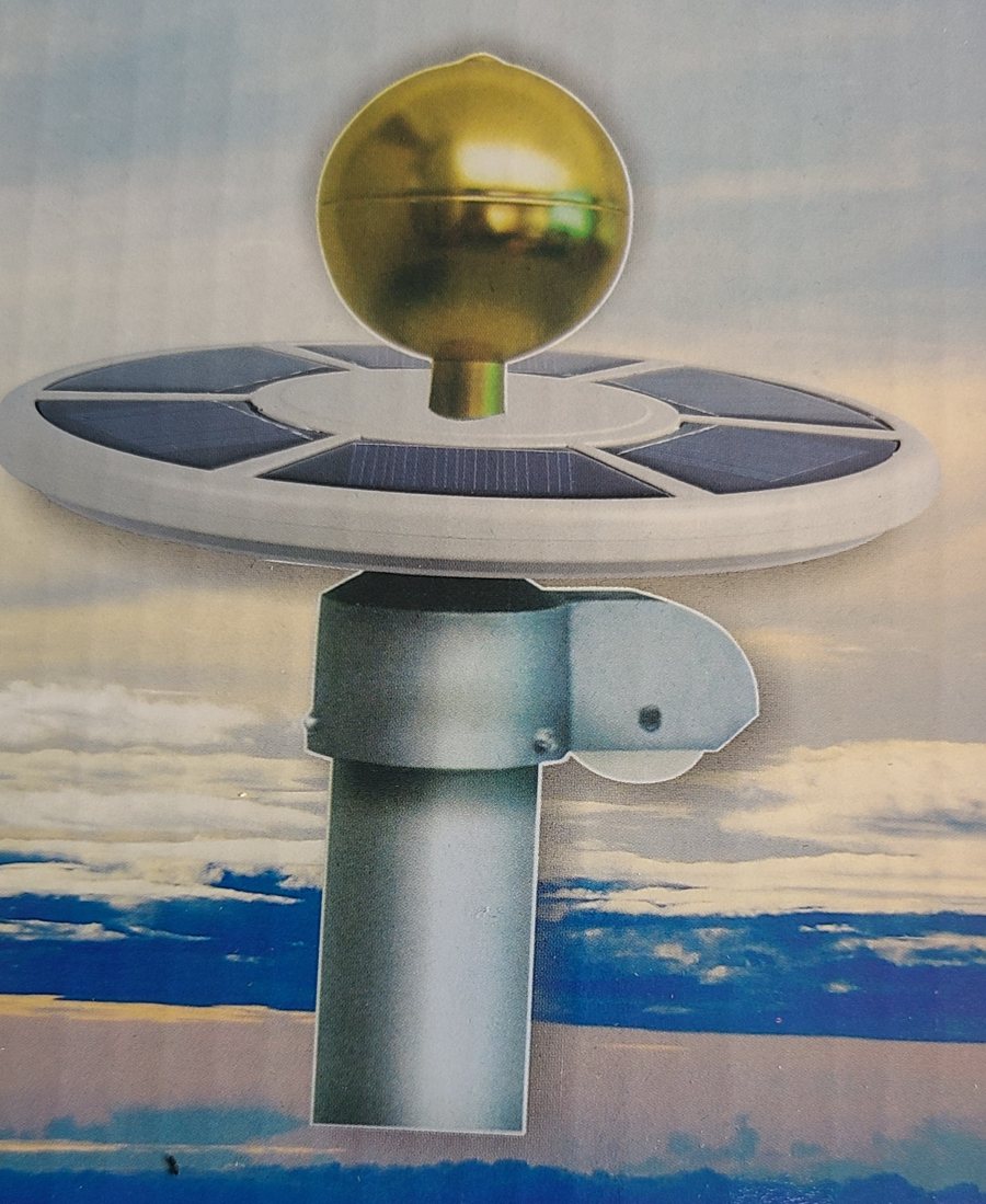 Solar flagpole light with gold ball ornament