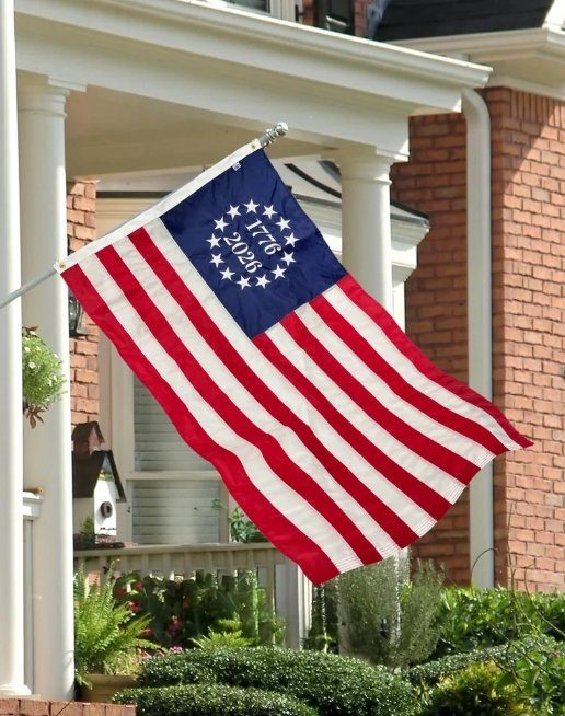 America's 250 Betsy Ross flag flying on a home porch