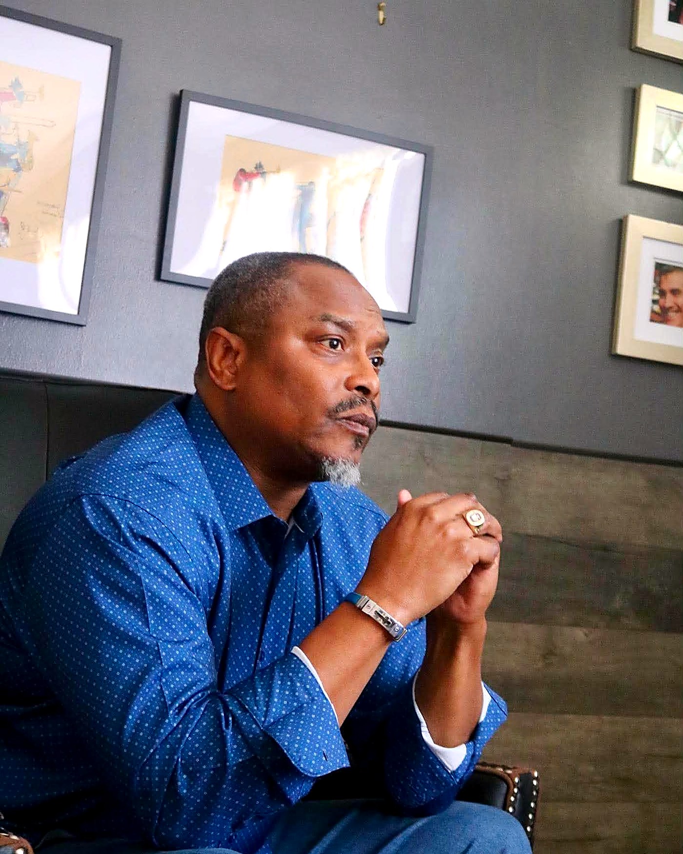 Richard Wooten leaning forward in conversation