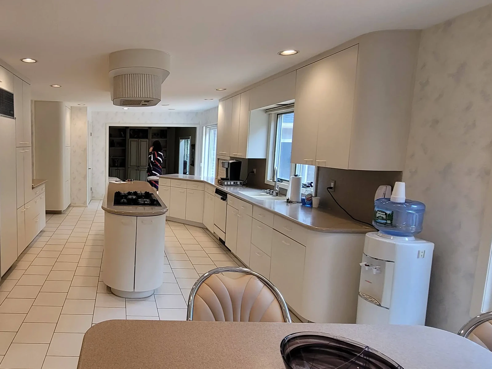East Brunswick kitchen with Royal Green painted cabinets and a Cambria slab wall, before