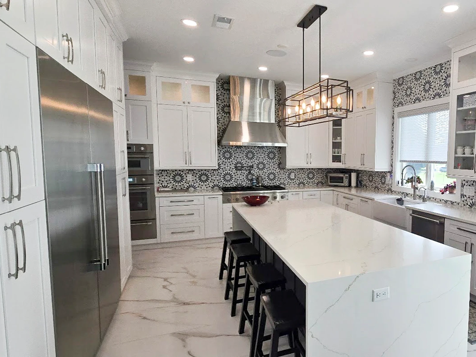 New-construction kitchen with tall wall cabinets under 10-foot ceilings