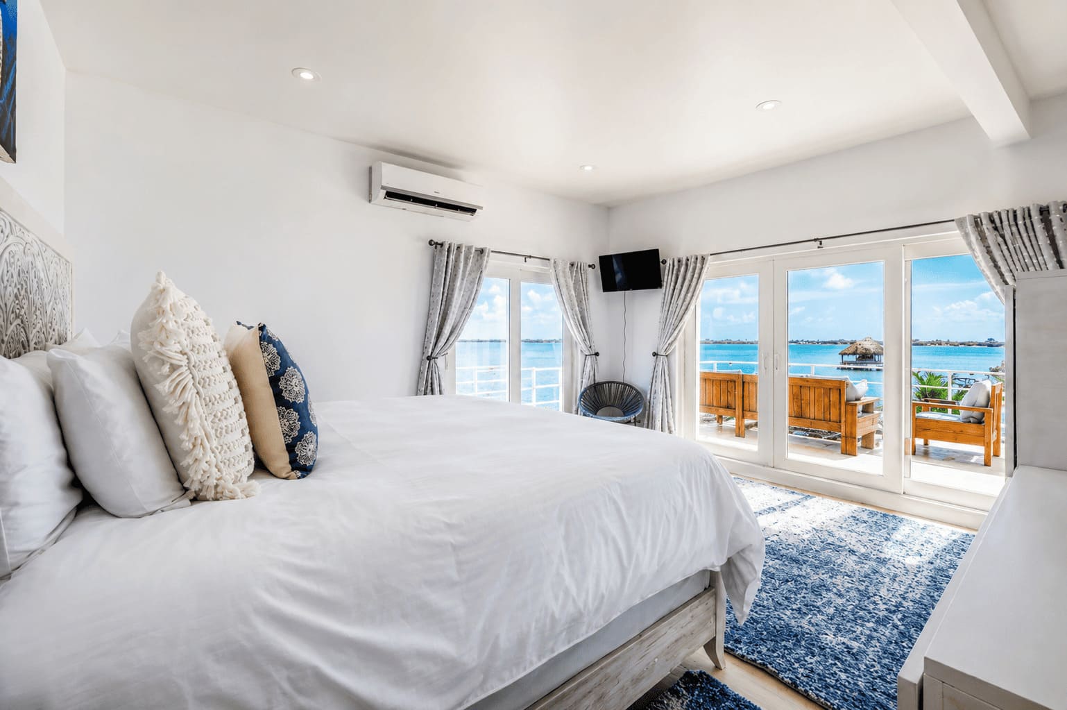 Master Suite at Fox Villa Belize with king bed and pool access
