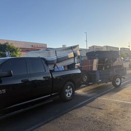 Loaded junk removal trailer ready for hauling