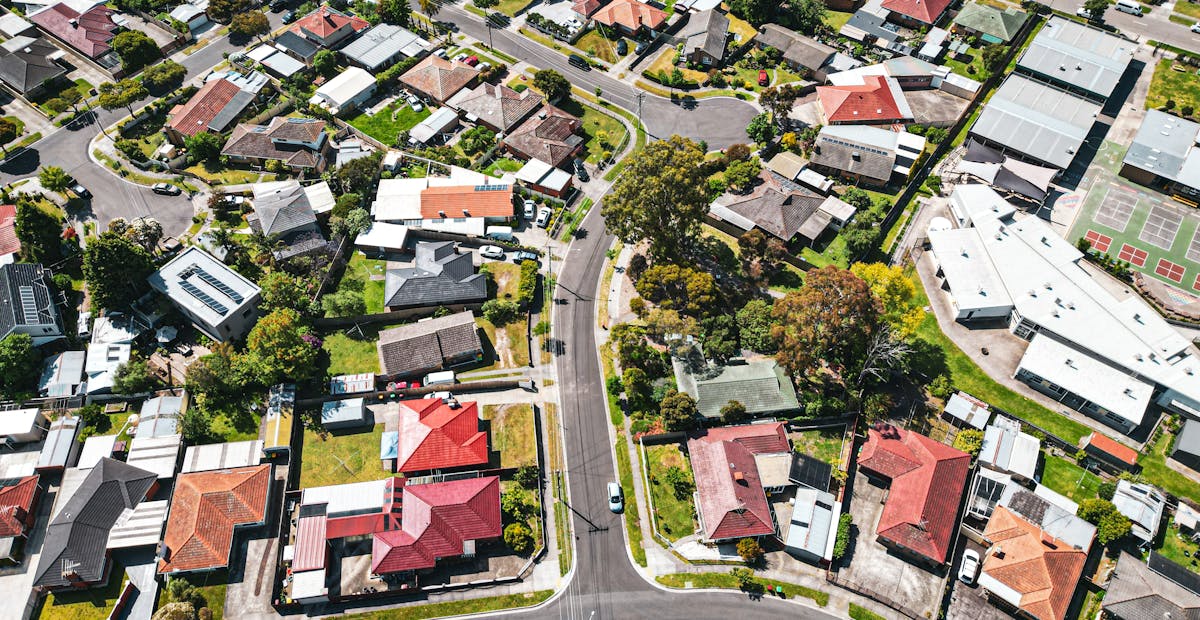 Aerial view of a single-storey suburban Victorian streetscape (stock photo, not a property represented by Positive Income Properties)