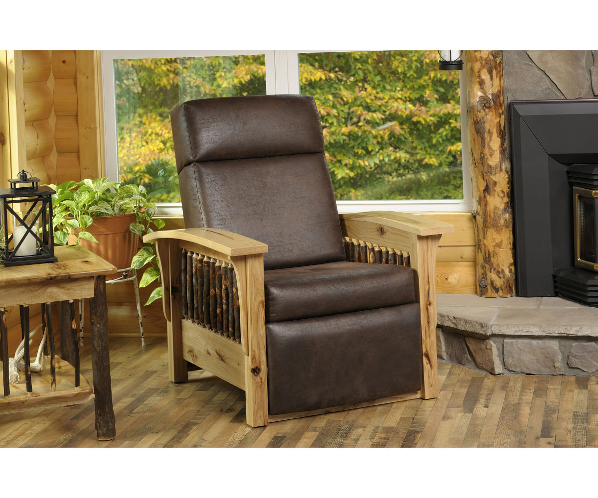 Recliner staged in a warm living room beside a fireplace