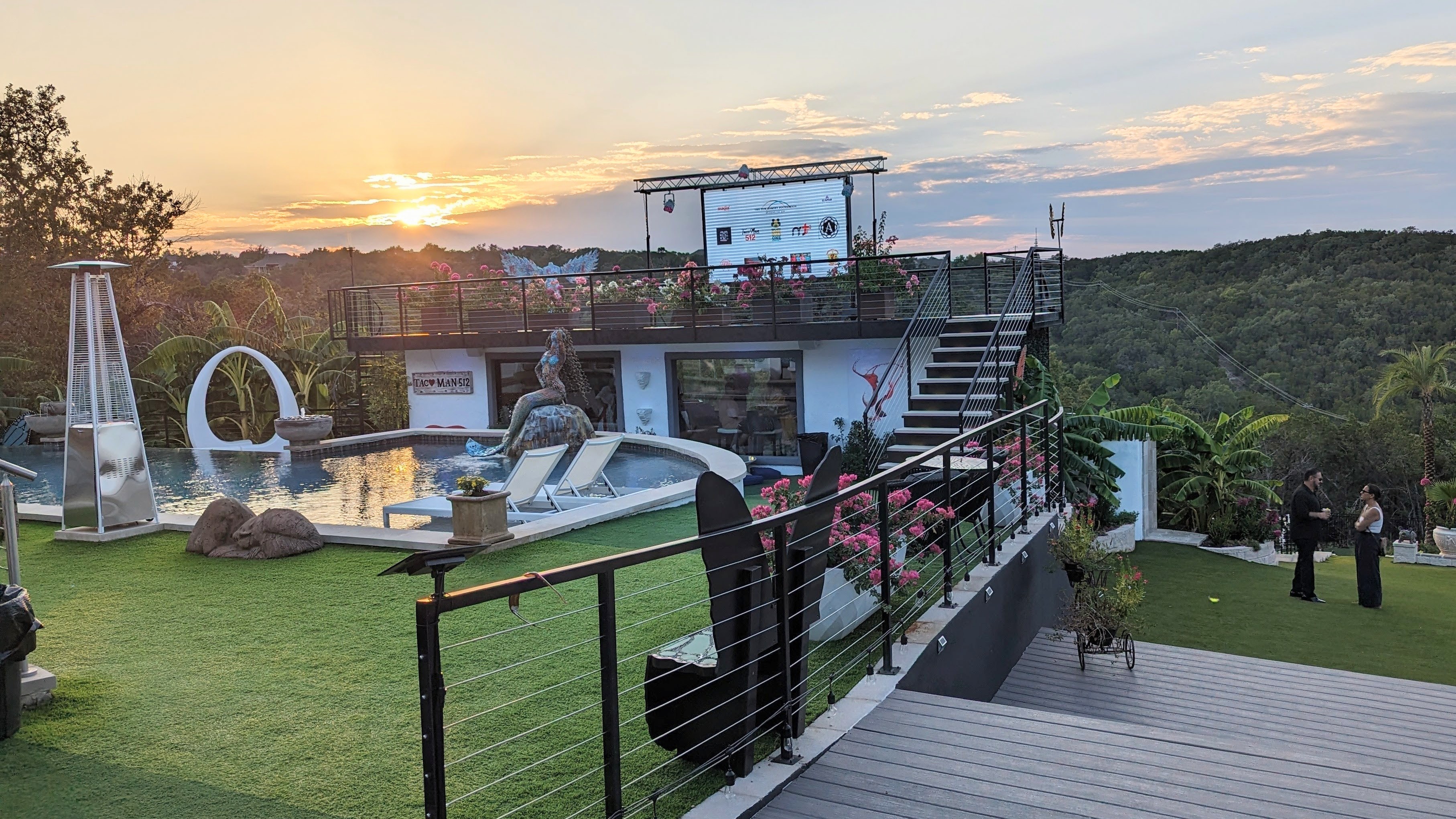 158 inch outdoor LED screen displaying a charity presentation at a poolside evening gala