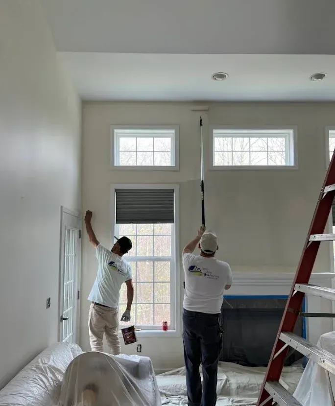 Interior walls and ceiling, two painters at work