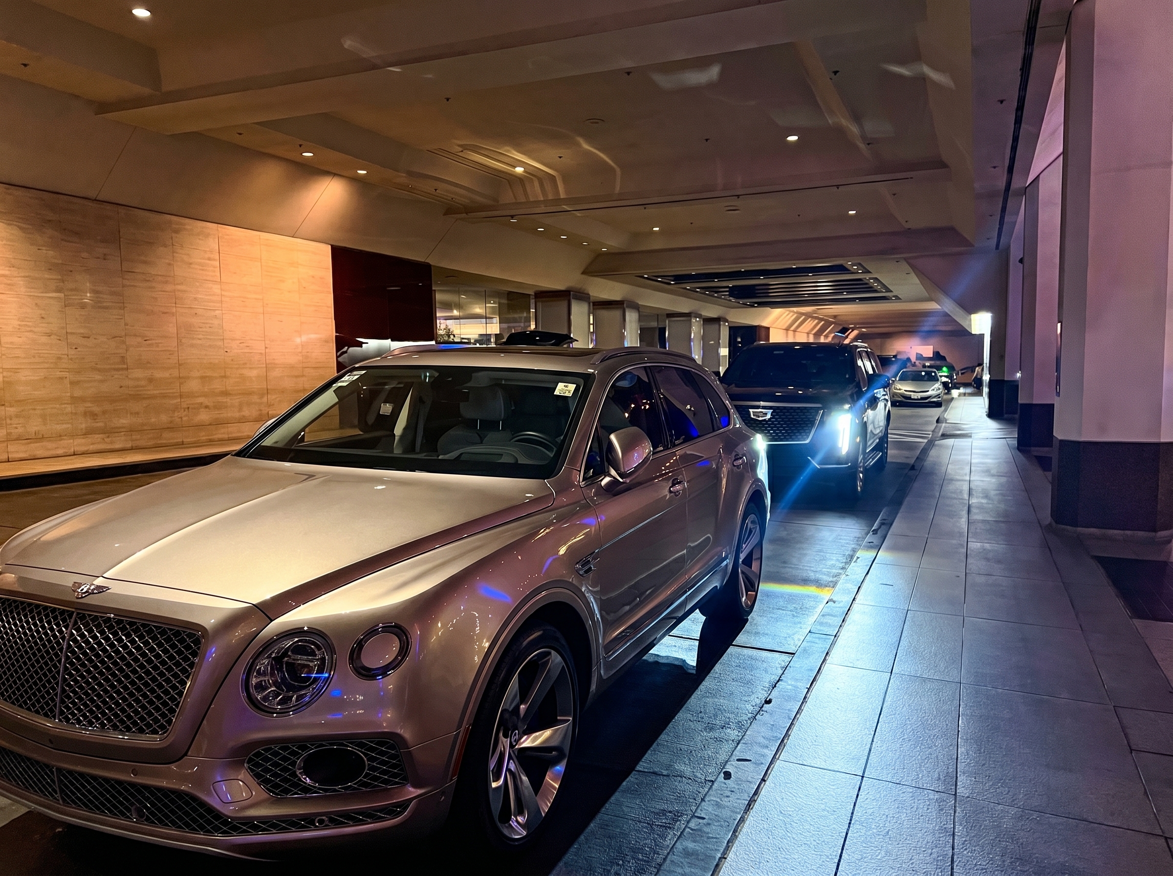 RideCaddy luxury Escalade at night — private chauffeur Orange County