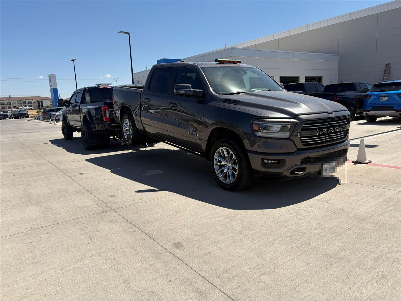 Ram 1500 on a wheel-lift tow