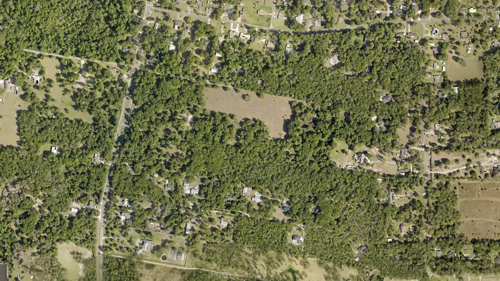 Volusia County aerial photo of the same land in 2024, with the loop road starting