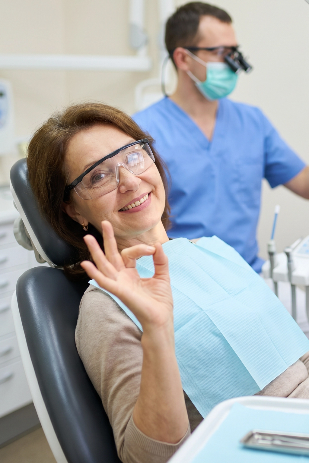 Dentist reviewing full-arch treatment with patient