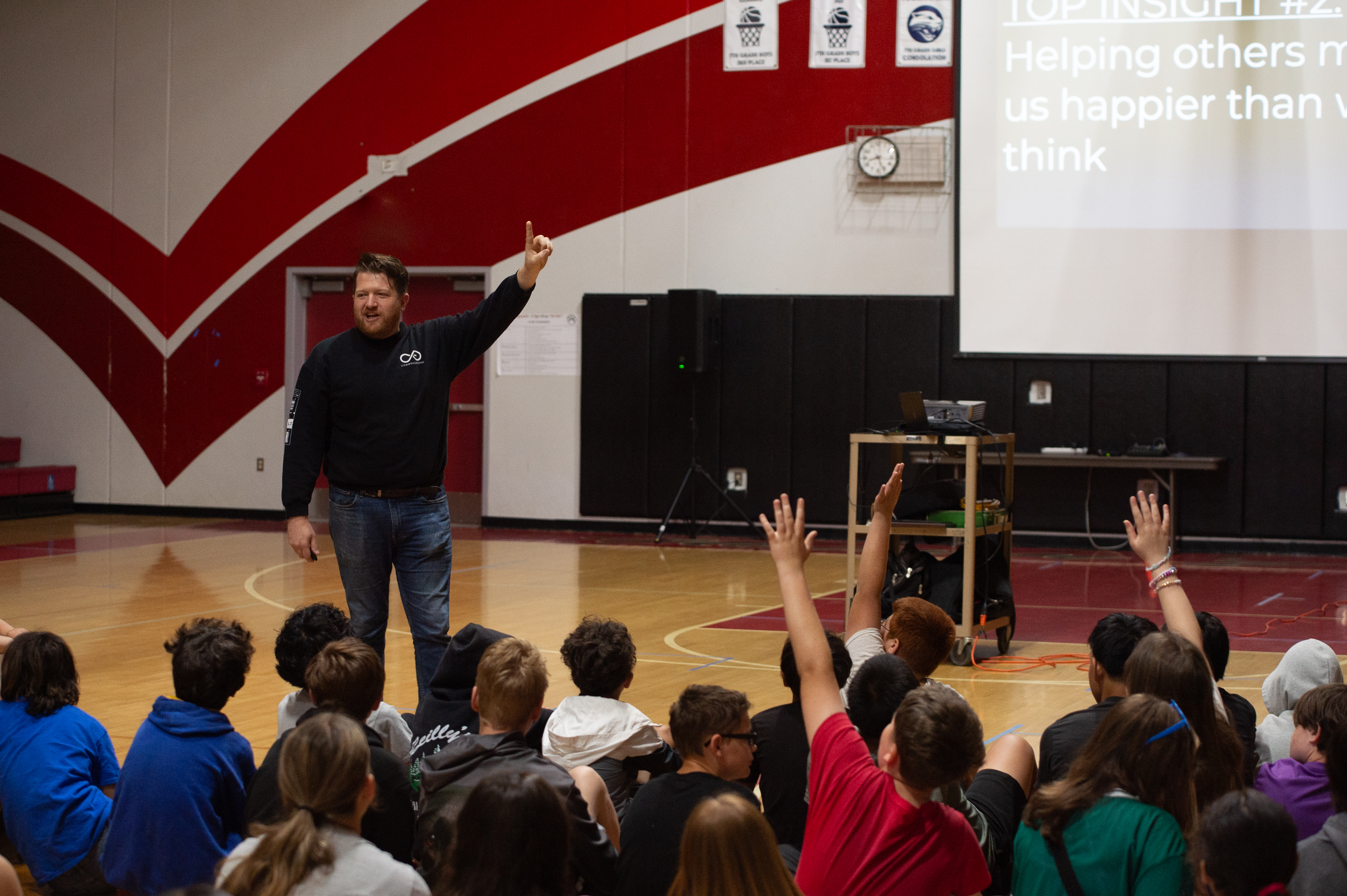 Jaymes Lackey speaking with students