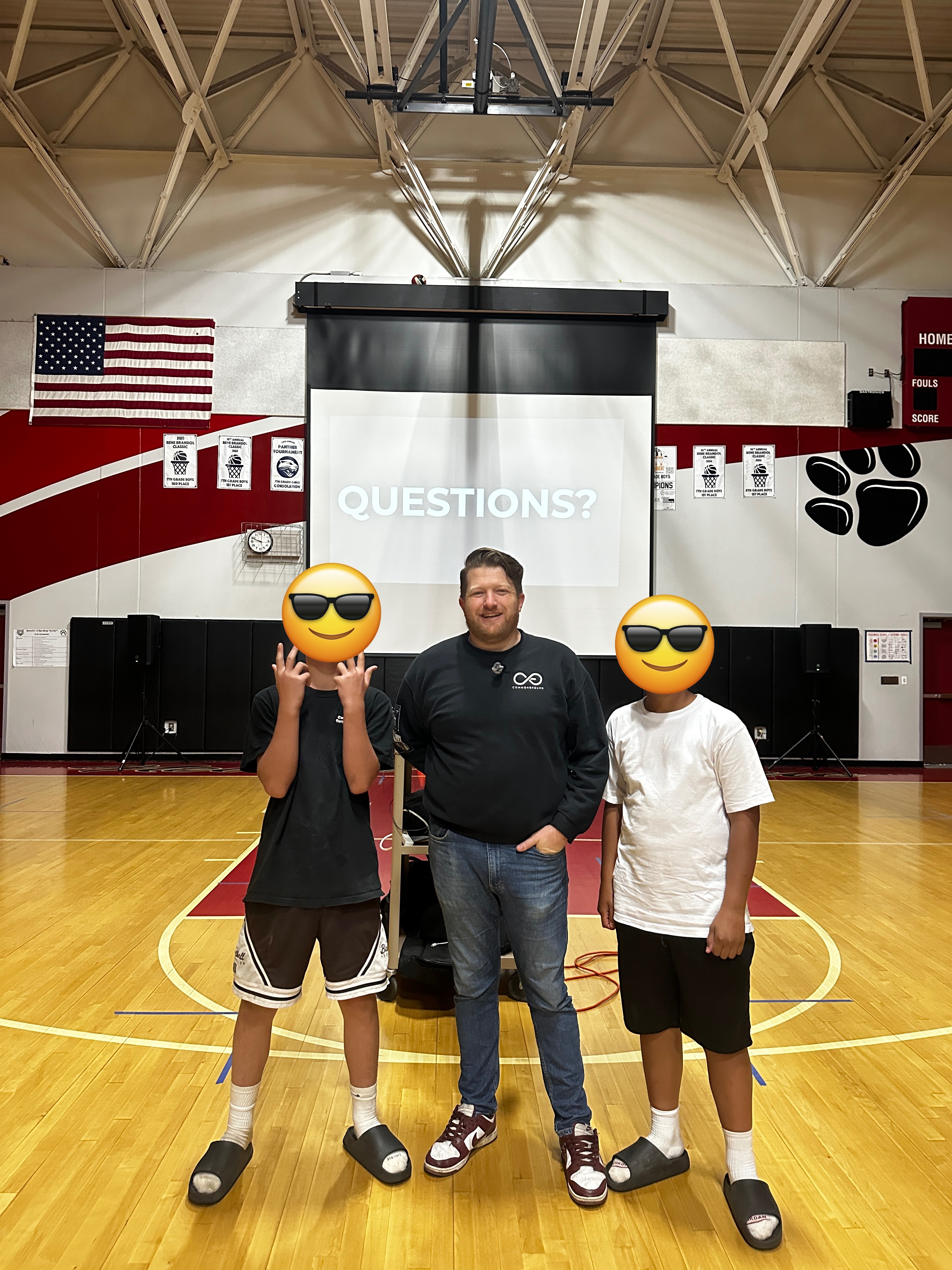 Jaymes with students at a school event