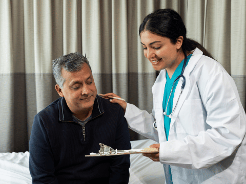 Family reviewing Premium Tax Credit eligibility with a OnePoint advisor