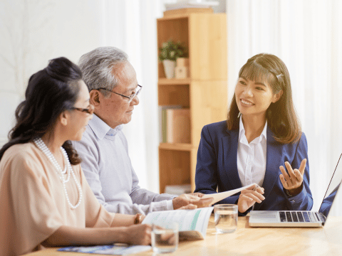Advisor helping couple with life insurance