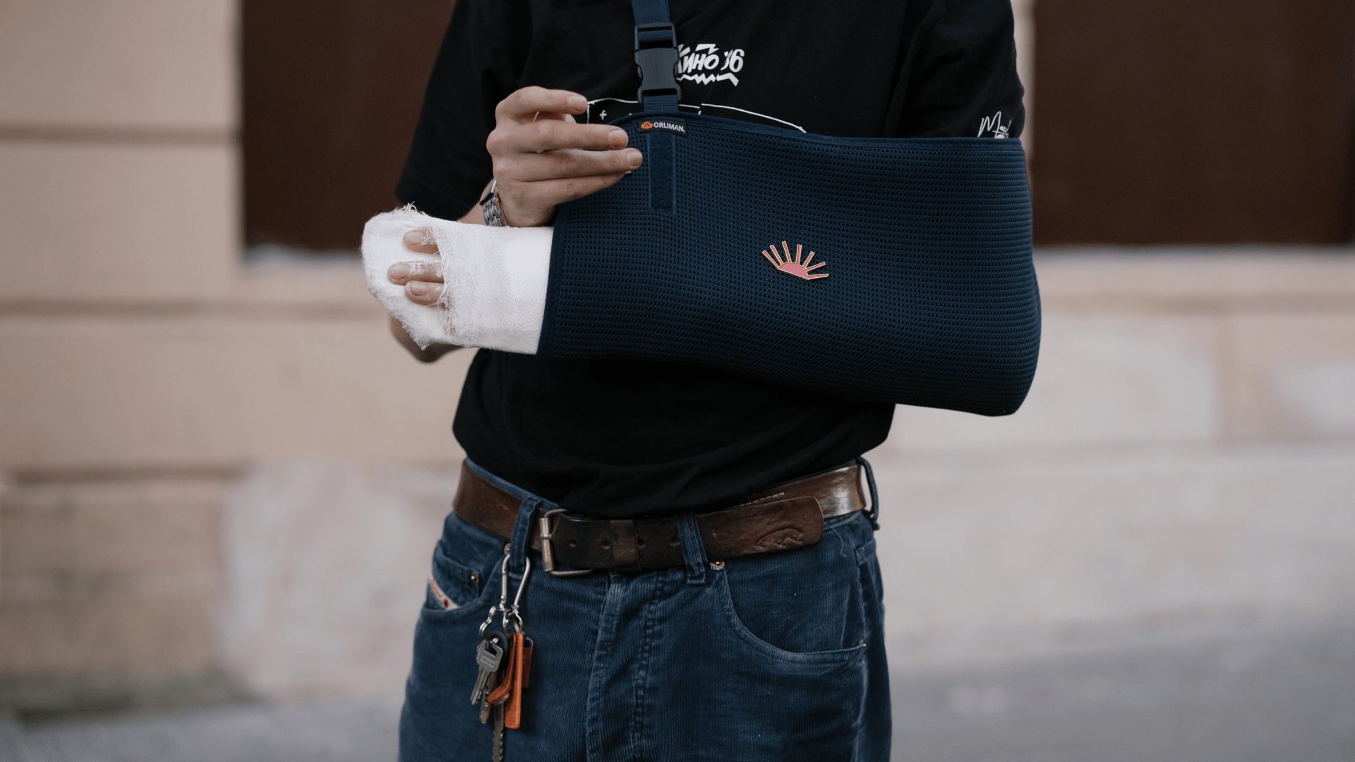 Arm in sling — disability income protection