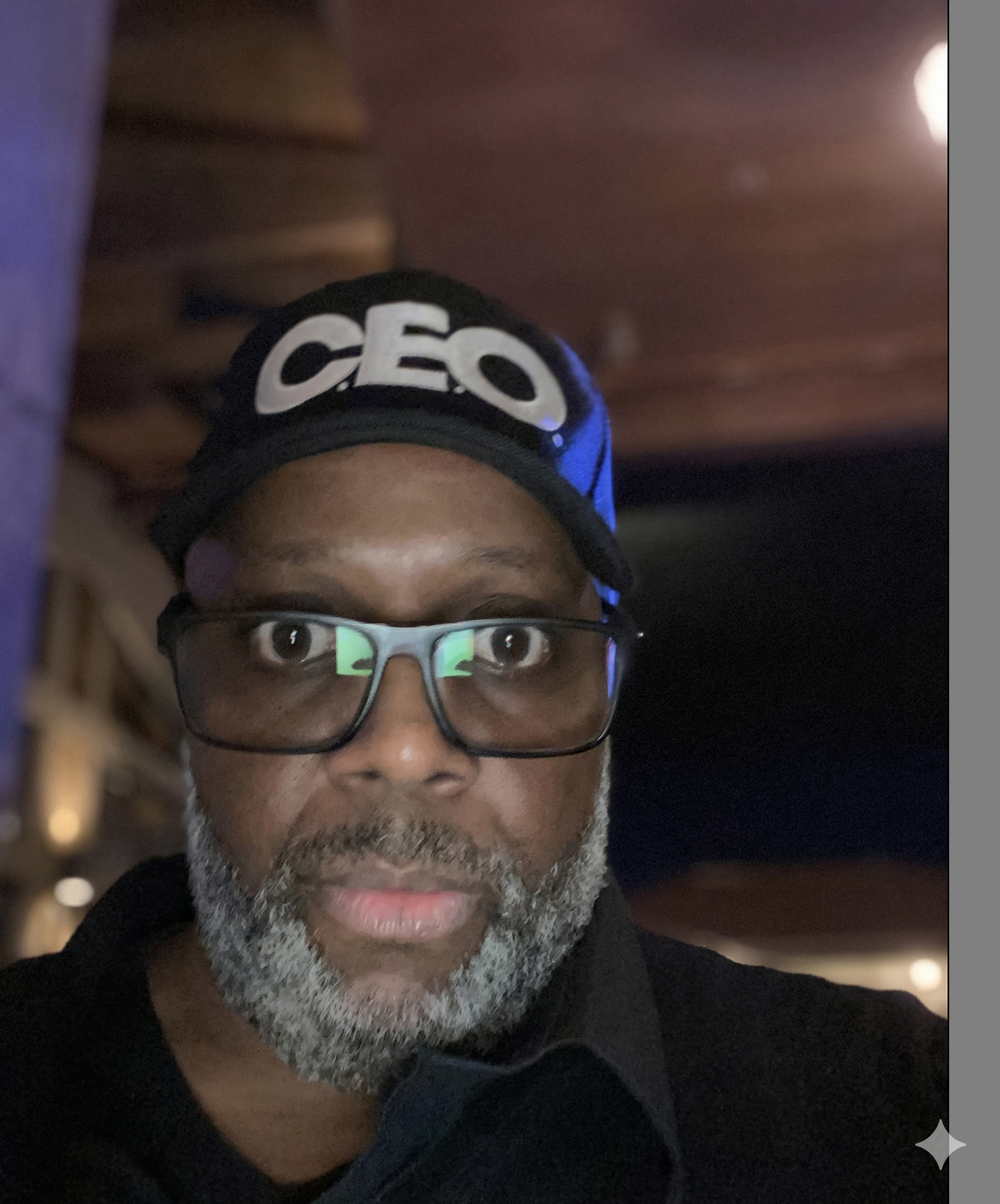 Chris Frazier with a CEO black cap