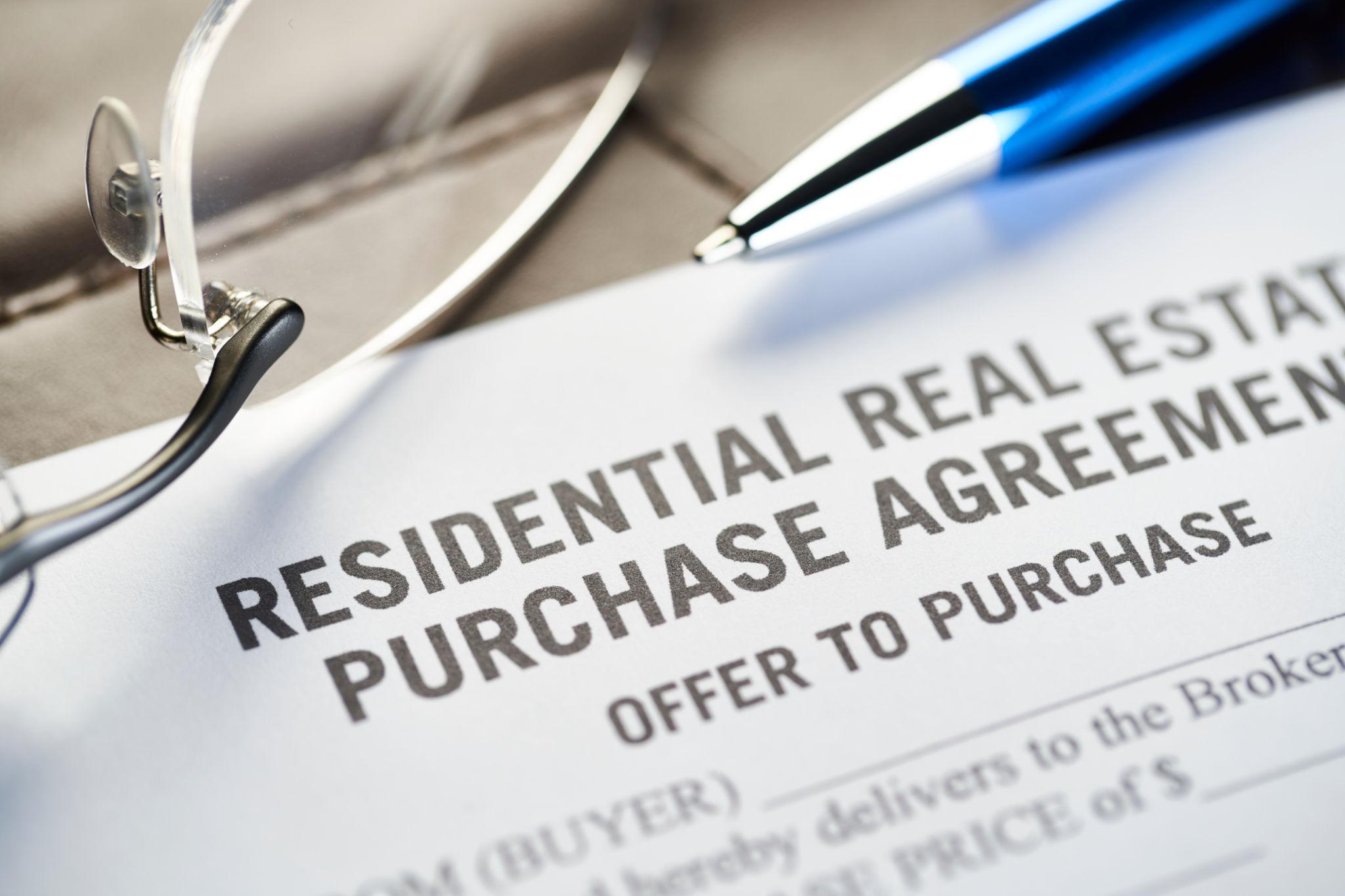 Real estate offer documents showing factors that influence home-buying decisions in Houston.