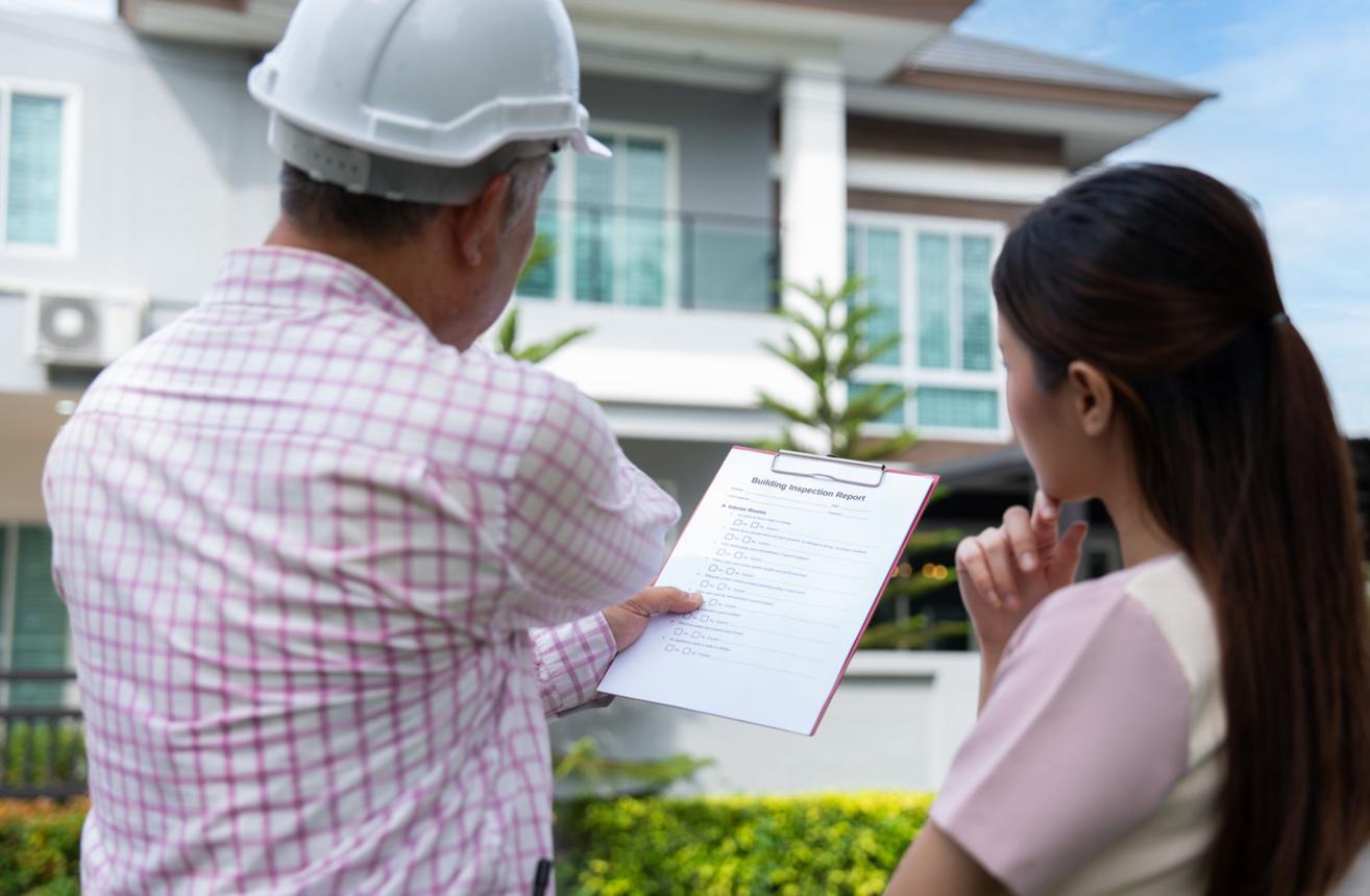 Professional home inspection identifying potential issues during a real estate transaction.