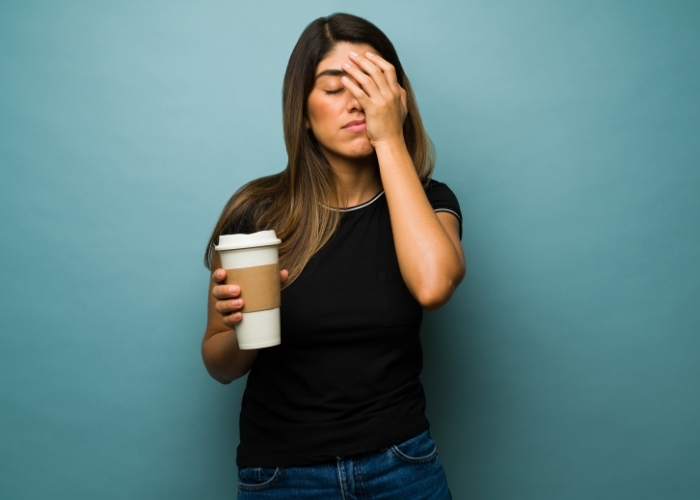 Woman Trying to Balance Blood Sugar Crash with Caffeine