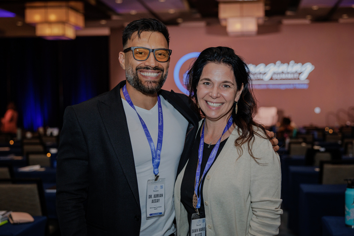 Dawn Marie Plotts with Dr. Adrian Accay at the Reimagining Health Summit (RHS)