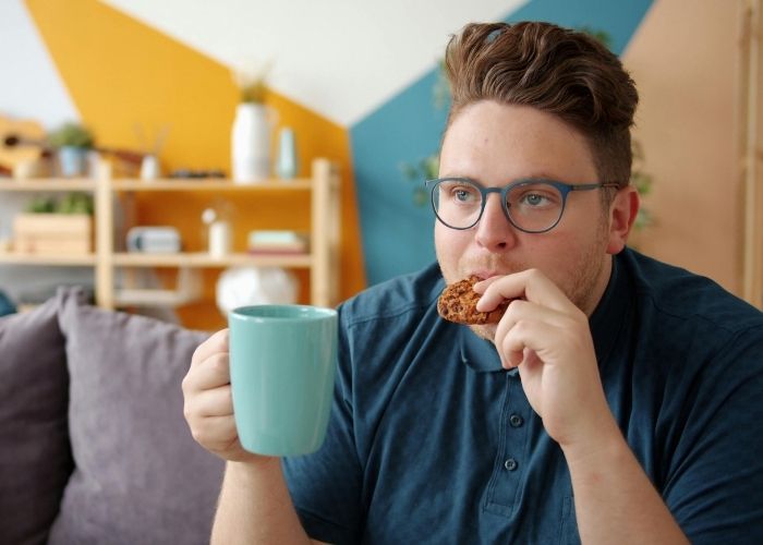 Man with Metabolic Imbalance Craving Sweets Man with Metabolic Imbalance Craving Sweets