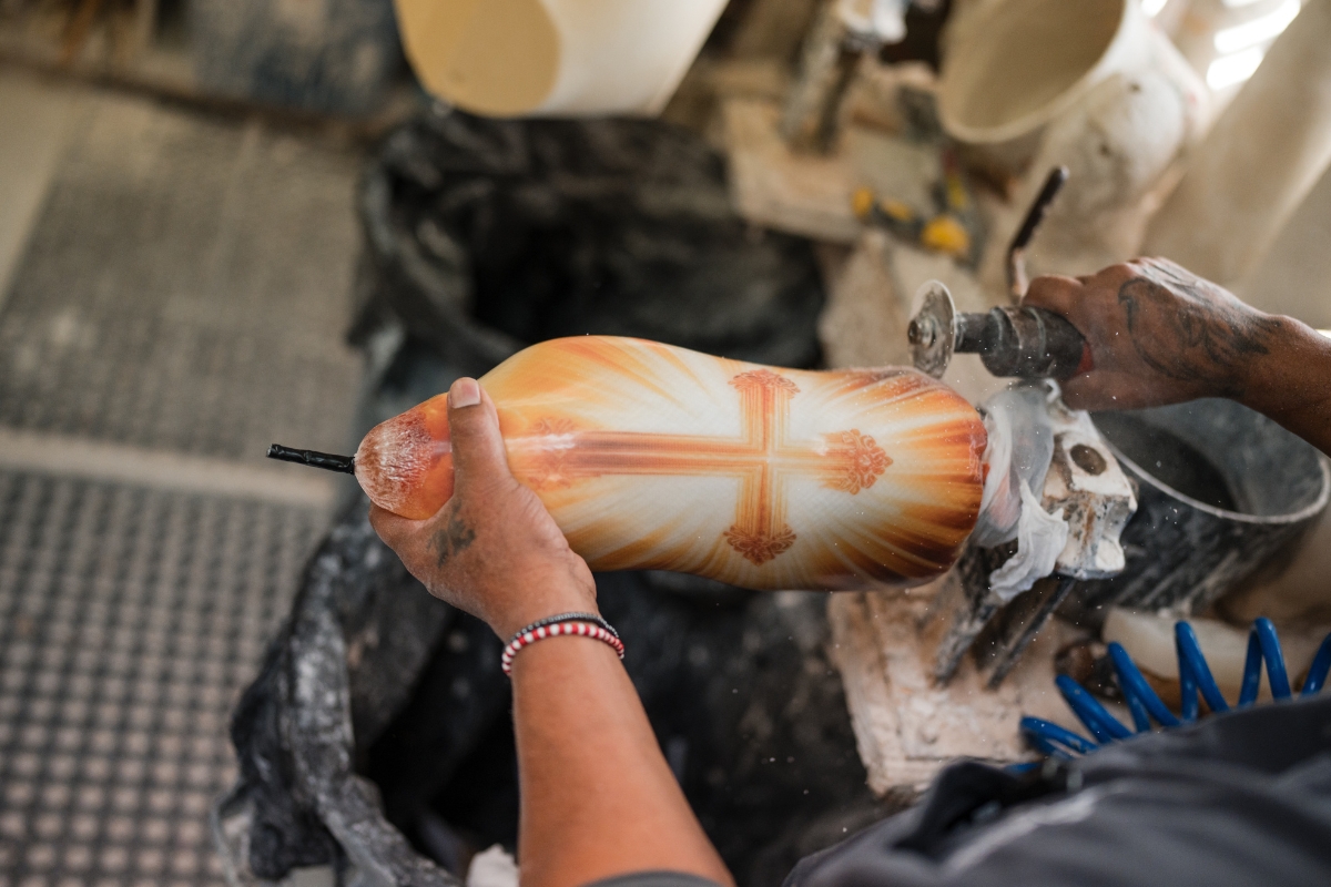 Custom prosthetic socket design being finished by hand for a personalized prosthesis