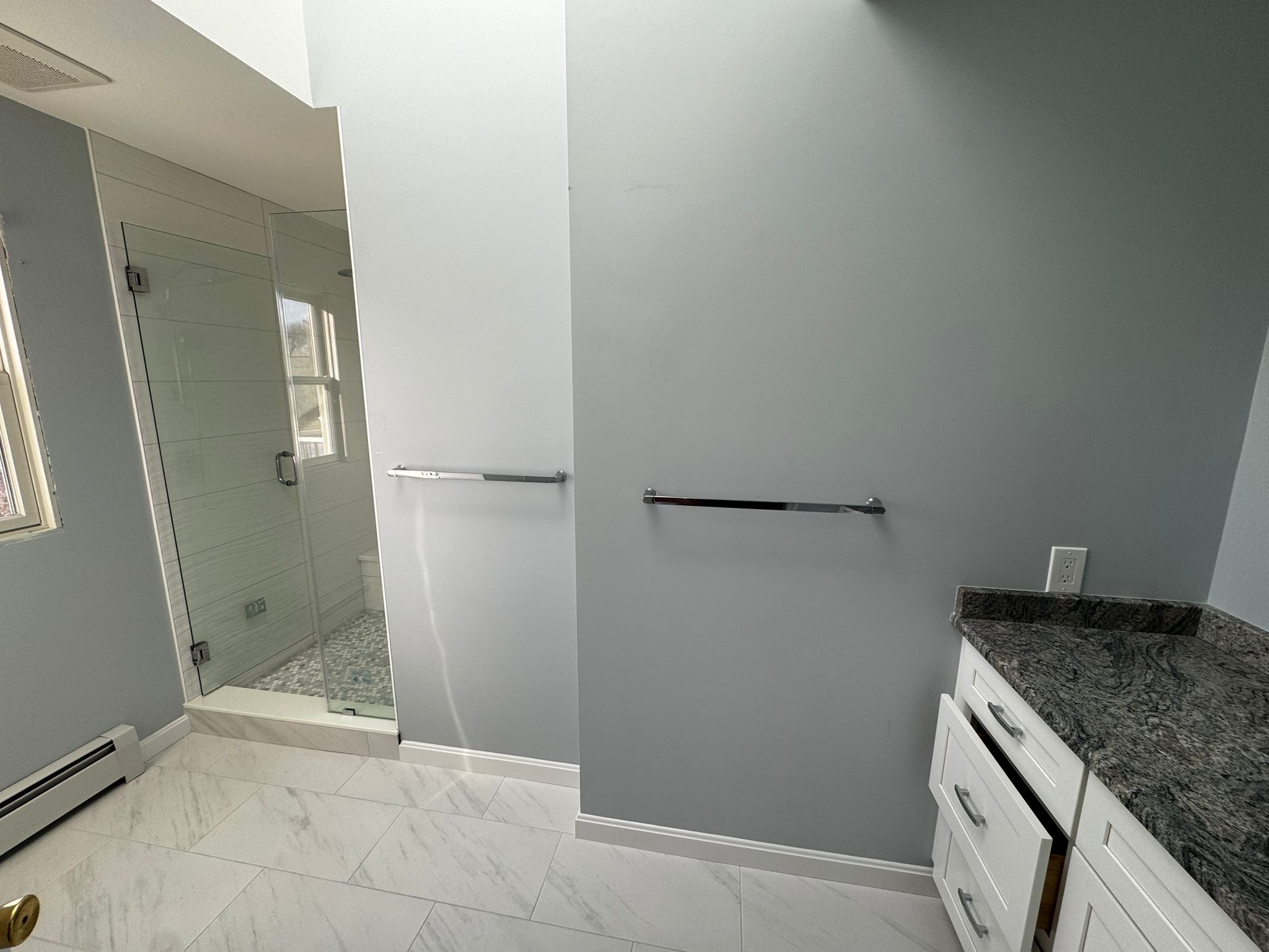 Bathroom remodel in Acton, MA — vanity and mirror