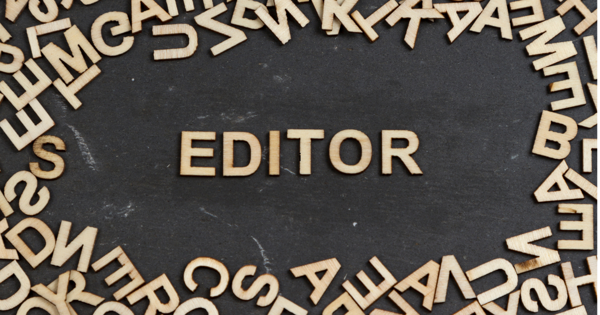 Editor spelled out in scrabble tiles Editor spelled out in scrabble tiles