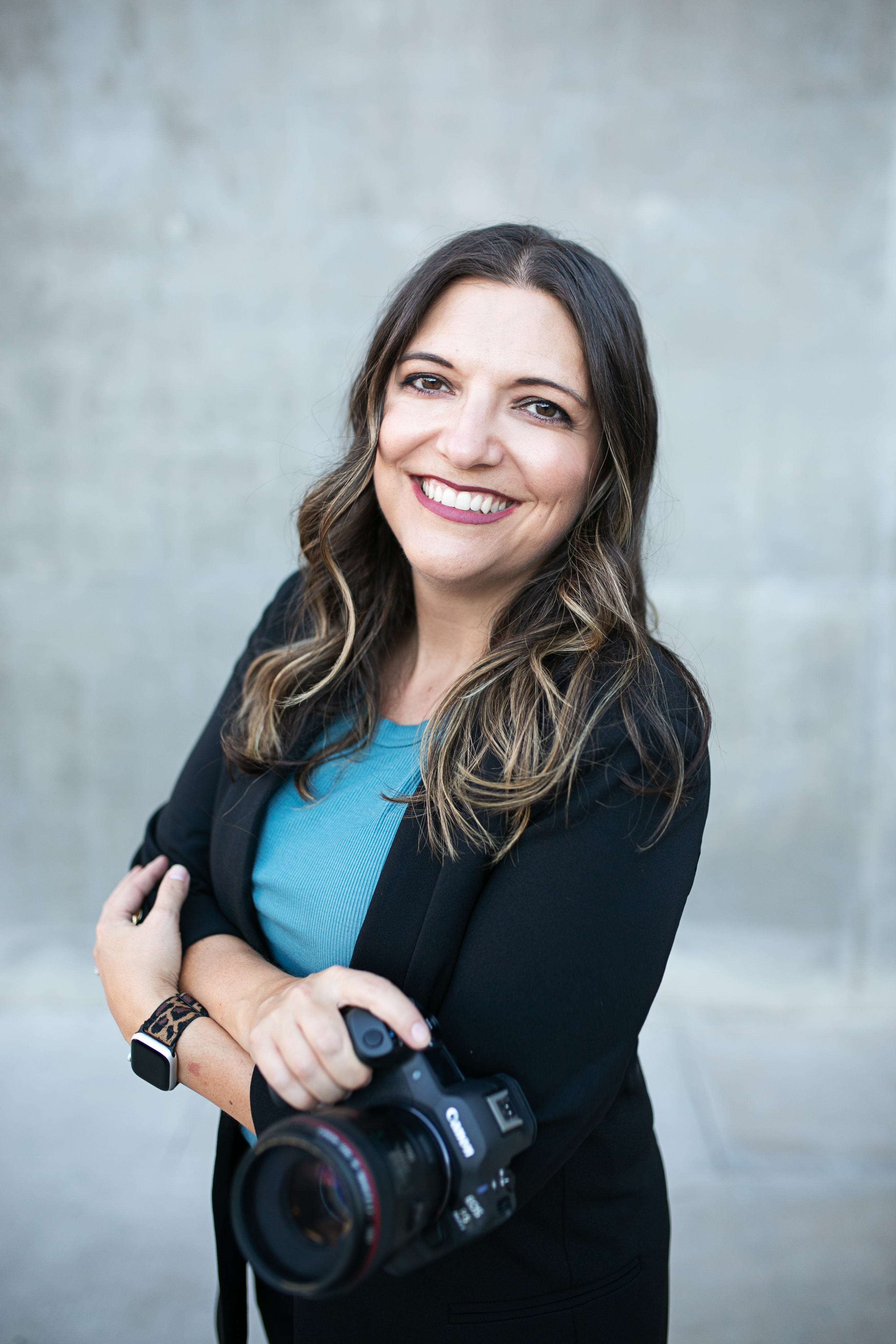 Headshot of Andria May, Gilbert family and senior photographer
